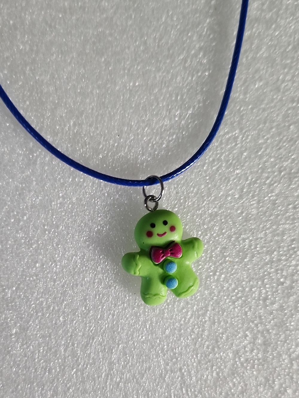 Hand Crafted Green Gingerbread Man Necklace with Blue Cord